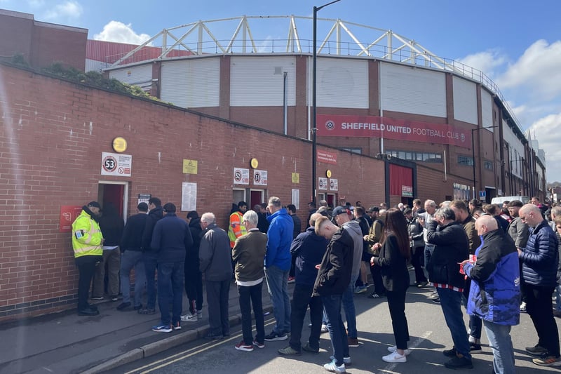 Sheffield United fans queue up outside Bramall Lane ahead of their match againt Cardiff City