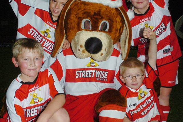 Young Rovers fans with Donny Dog are (l-r) Liam Early, ten, of Bristol, Alice Moores, eleven, of Sykehouse, brother Andrew Moores, eight, and Tyran Jordan, seven, of Bristol.