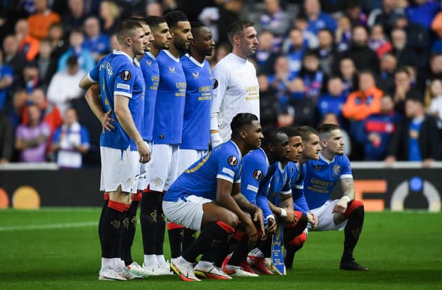 Rangers line up prior to kick off against Lyon.