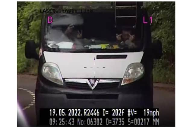 A van driver and his passenger were snapped on a Sheffield road giving 'the finger' to a police van. Unfortunately, they had removed their license plates and were snapped even though they weren't speeding.