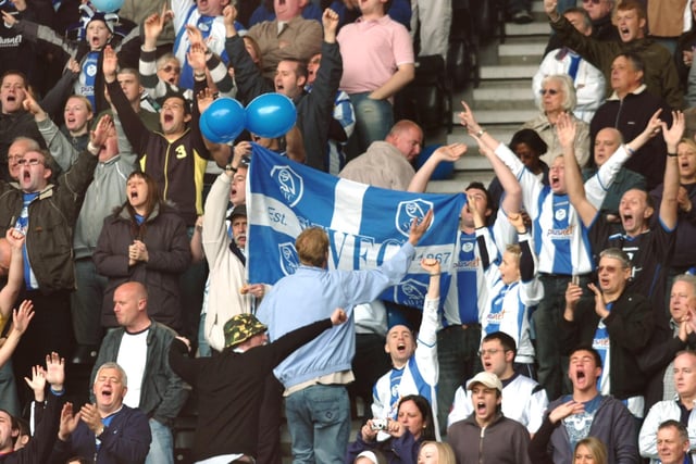 Wednesday fans were in fine voice and decked out in a variety of colourful outfits for their side's game at Derby County on April 30, 2006.