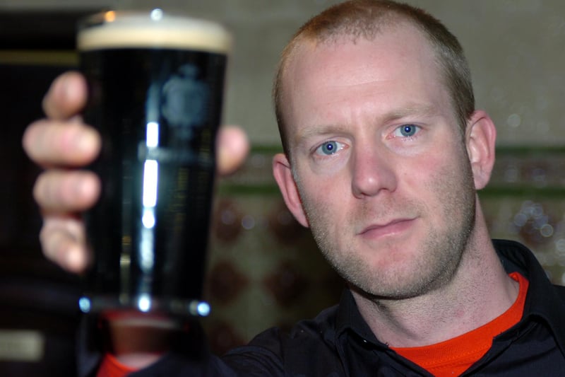 Manager Pete Dakin checks out the first pint pulled of the Thornbridge Brewery stout Exposed at the Sheffield Tap pub on Sheffield Midland Station in May 2010