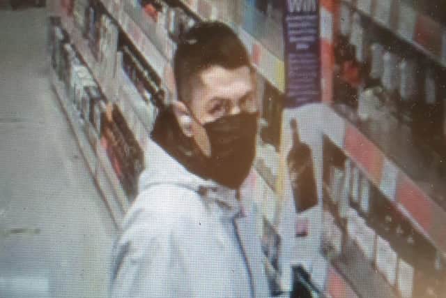 Police want to speak to this man over an investigation at a supermarket at Crystal Peaks