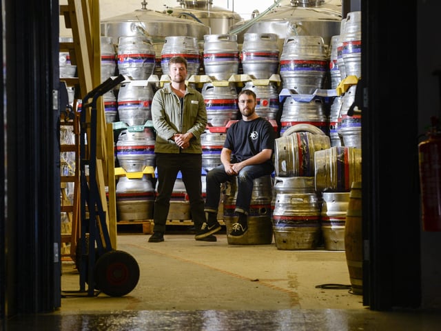 Jordan Roberts and Ben Smith, from the Factory Floor team, looking from Neepsend Brewery Co. towards the bar.