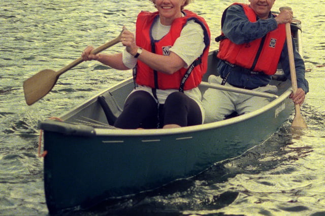 Fundraiser Helen Burrell and radio personality Tony Capstick got in some practice for the Charity Canadian Canoe Race  at the Canal basin in 1998