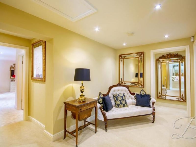 At the top of the stairs, you are greeted by this charming landing. Take a seat, madam, before you inspect the bedrooms.