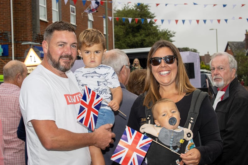 Newly Weds Darren and Daisy North, with their children Ned, 2 and Otto 11 months getting in the party spirit during the Lee Victory Parade in Lee-on-Solent on the 25th September 2021. Photo By Alex Shute