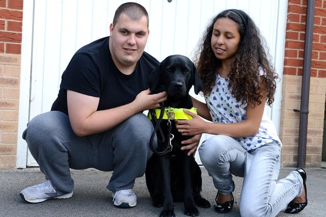 Tyler Henderson, aged 24, wife Tatum, aged 20, and guide dog Riley back in 2013