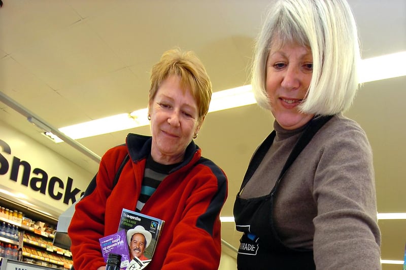 Dot Miller (right) on the Fairtrade stand at the Edlington Co-op, with customer Christine Atherton, of Warmsworth in 2009