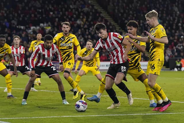 Sheffield United defender Anel Ahmedhodzic in action before being forced off against Rotherham by illness: Andrew Yates / Sportimage