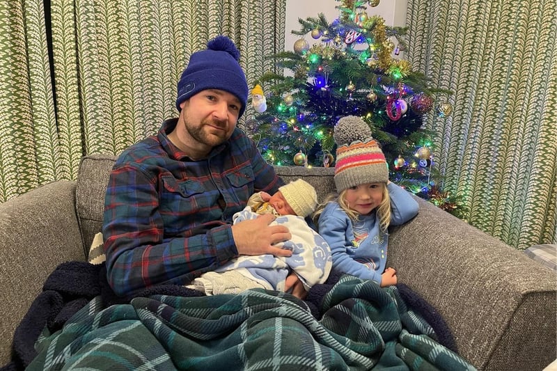 Pictured here is dad Chris Brzozowski with his daughter Orla and newborn baby Oisin trying to keep warm. The family came home from her delivery on December 3 to find their home without heating for their newborn. They painted a picture of how residents were "terrified" of leaving their homes despite how cold they were because it risked missing a visit from the Cadent engineers. 