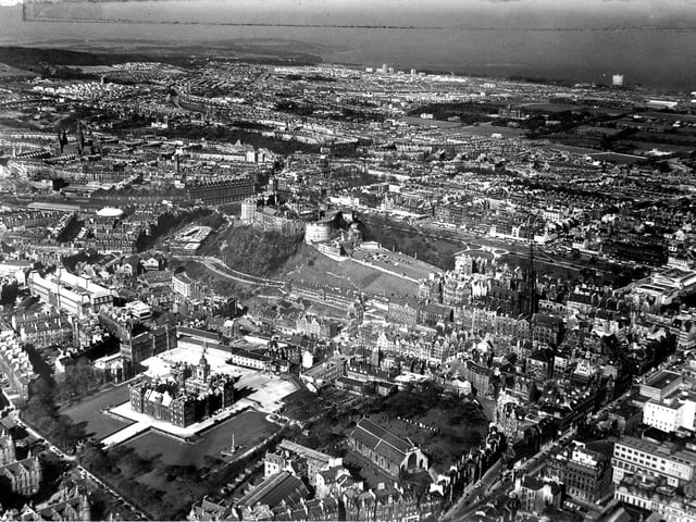 An aerial view of Edinburgh, showing George Heriot's School in the foreground and Edinburgh Castle behind, shows how the capital looked back in 1965