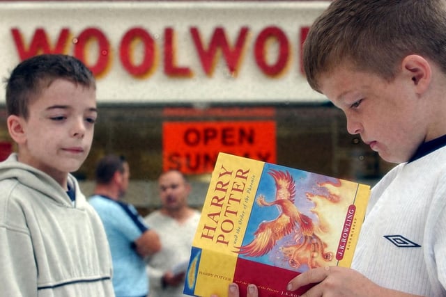 These fans snapped up a new Harry Potter book at Woolworths 17 years ago. Do you recognise the young Potter fans?