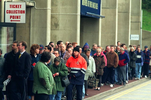 Fans in a queue for FA Cup replay tickets