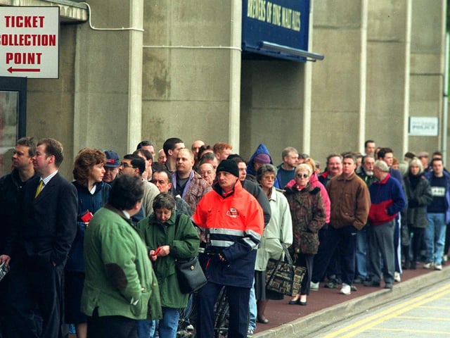 Fans in a queue for FA Cup replay tickets