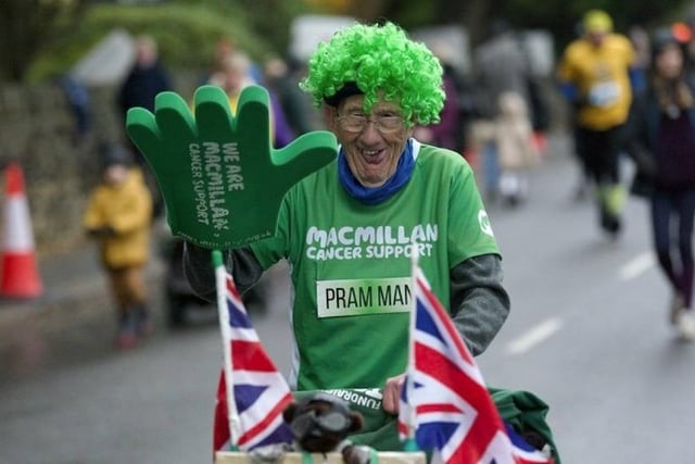 If you've ever been at an event in Sheffield's city centre, you're bound to have met the wonderful John Burkhill. John, also known as the Man with the Pram, has been fundraising for Macmillan Cancer Support for over 15 years with a goal of raising £1,000,000. His crazy, green afro wig and enthusiastic high-fives makes him a sight difficult to miss as he pushes what was his daughter's pram around the city as he collects donations.