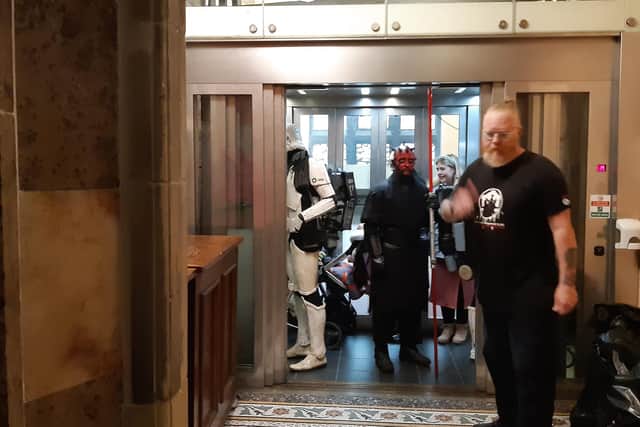Star Wars Stormtroopers and Darth Maul enter a lift, turning a few heads in Sheffield town hall as, as the landmark building was opened up for the city’s Out of This World festival, a celebration of all things science fiction, magic, or Halloween.