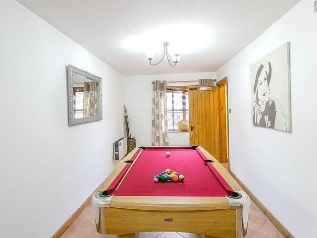 Fancy a game of pool? While away the hours in this games room, which can be found in Woodman's Cottage.