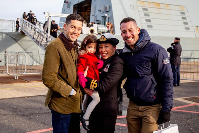 Daniel Hill, Sophia 3, Kelly Jenkins-Hill, Simon Jenkins in front of HMS Defender. Picture: Habibur Rahman
