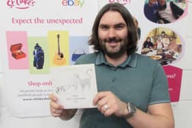 Shaun Beeden of the St Luke's eBay team with the rare Def Leppard EP.