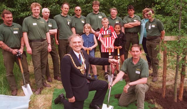 Norfolk Park Sheffield in 1996 where the park ranger scheme was launched. Lord Mayor of Sheffield Councillor Peter Price with school children from Park Hill Primary who helped plant a tree to mark the occasion
