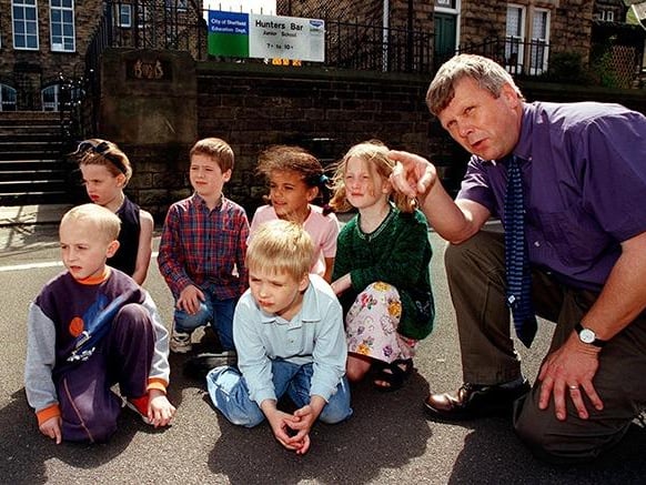 Head teacher David King of Hunter's Bar Junior School shows next years kids around the school on July 13, 1998