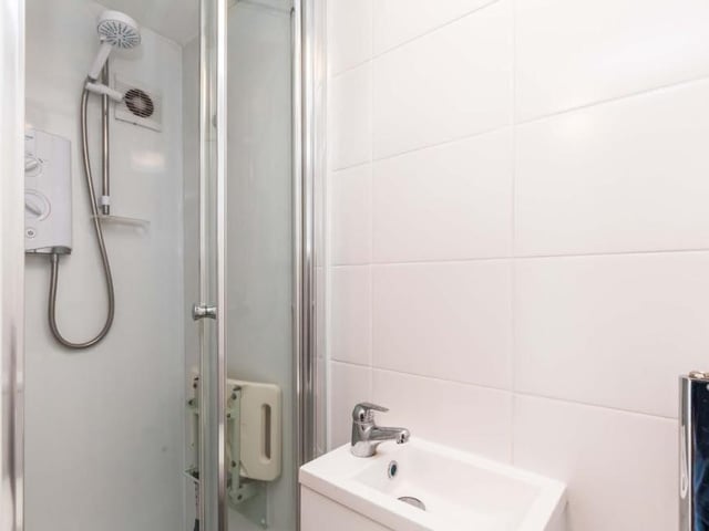 The downstairs shower room and WC from a different angle. It's just a question of stepping in to the shower enclosure.