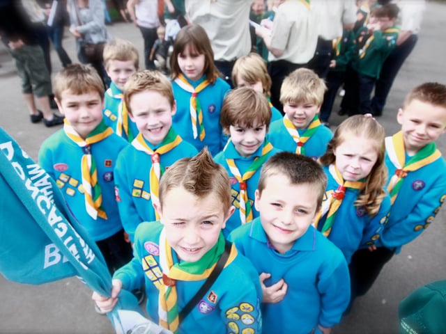 Children from 1/36th Doncaster St Peters Beaver Group takes part in a St George's Day parade in Doncaster