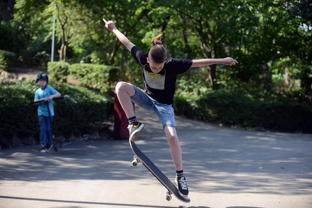 Andrew Caine, age 10, shows us a few tricks on his skateboard.