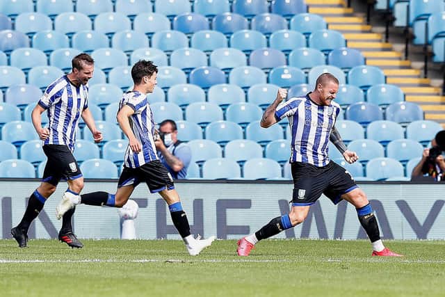 Alex Hunt celebrates with Sheffield Wednesday goalscorer, Connor Wickham. (Martin Rickett/PA Wire)