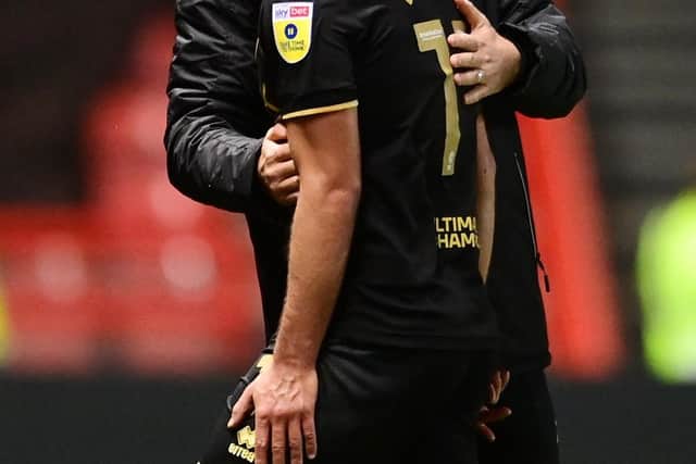 Paul Heckingbottom embraces Sheffield United youngster Reda Khadra after taking him off at Bristol City: Ashley Crowden / Sportimage
