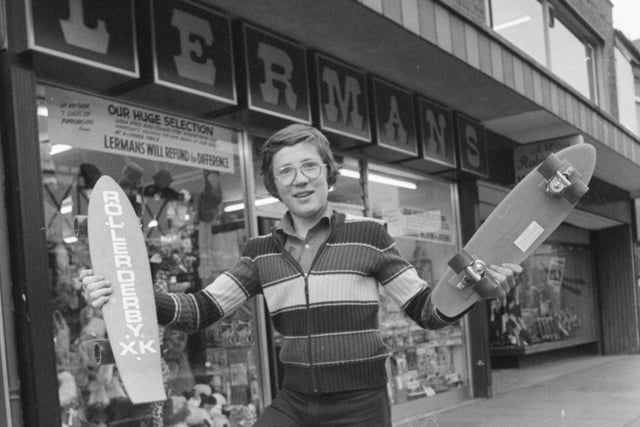 Sales assistant Martin Senior with a selection of skateboards outside the shop in Holmeside in 1977.