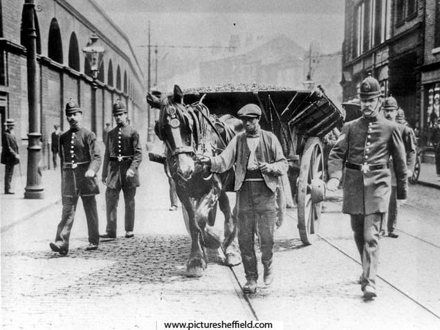 A carter with a police escort during the 1911 Coal Strike with Police Sgt Joe Hurst, right. www.picturesheffield.com Ref: s03756