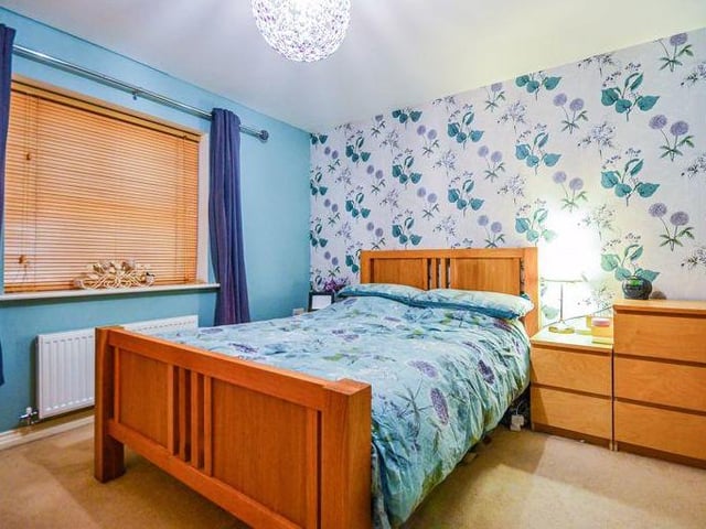 The master bedroom is pleasant, and has its own en suite facilities.