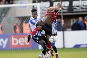 Chey Dunkley scored for Sheffield Wednesday in their 2-2 draw with Cheltenham Town.
