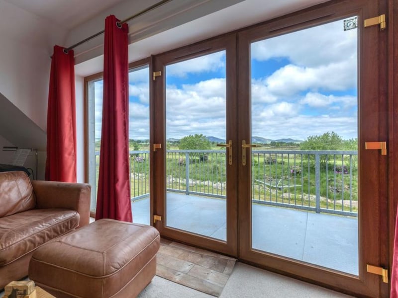 Living room with balcony.