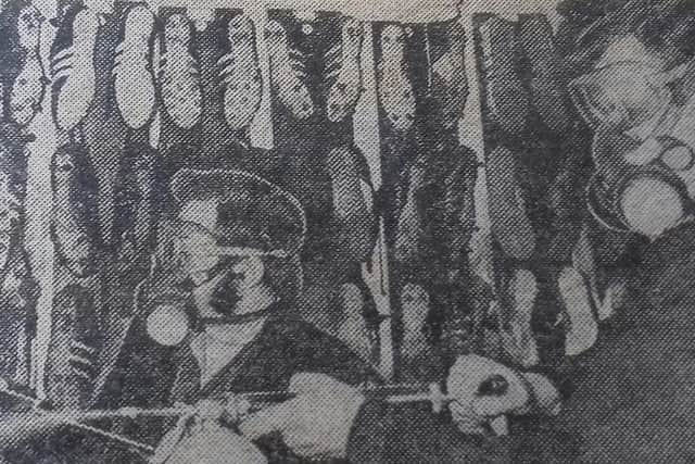 The Ministry of Fumigation take to the boot room at Hillsborough amid the mystery virus crisis at Sheffield Wednesday in 1973. Credit: Daily Mirror 1973