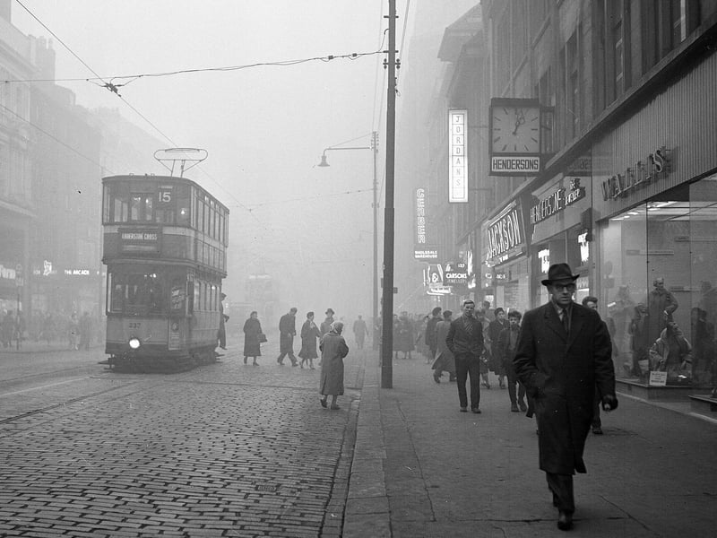 Fog in Argyle Street at lunchtime - Shop signs lit up, 1950s.
