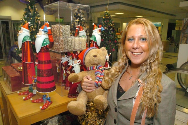 Jade Wilkinson the visual merchadising manager  for house of Fraser was seen with some of the Christmas  goods includiung the 2005 Fraserbear