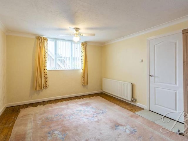 It looks bare now, but the first and largest bedroom is a good space. It comes complete with fitted wardrobes, central-heating radiator and window to the back of the property.