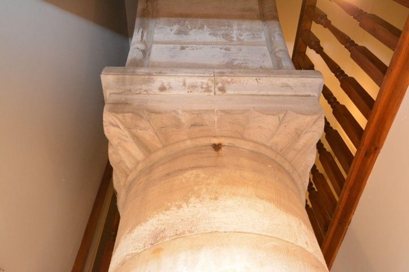 Tuscan-style sandstone column.