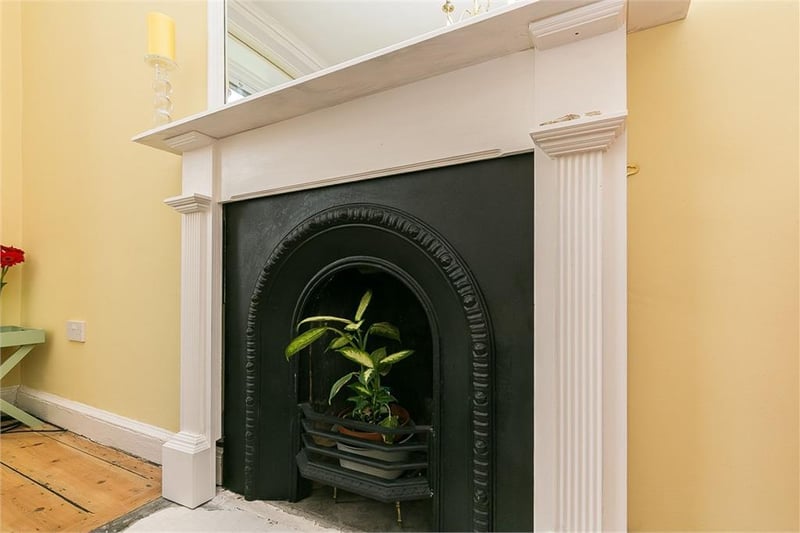 Decorative fireplace in bedroom 1.