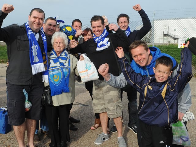 Fans get ready to board their buses for Wembley at Fratton Park.