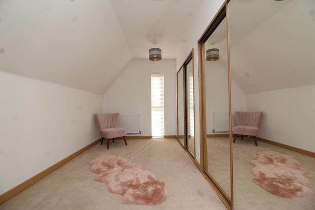 Tucked away on the top floor along with the master bedroom and en-suite, this dressing room comes complete with plenty of fitted wardrobe space .