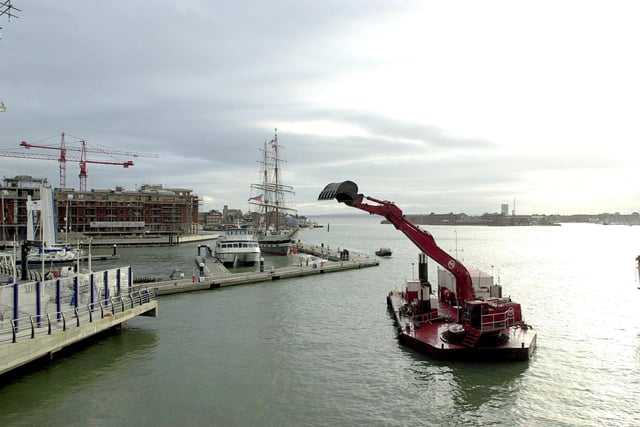 Construction of the Millennium Tower, as it was known, at Gunwharf Quays started with the dredging of the seabed. 6th November 2001. Picture The News (015780-2)
