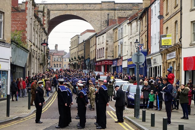 The parade passed under the town's viaduct