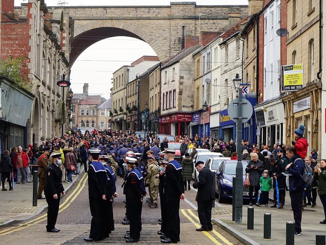 The parade passed under the town's viaduct