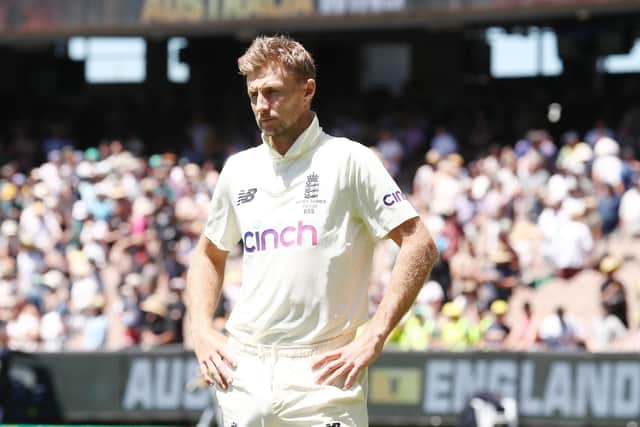 England's Joe Root looks dejected after defeat during day three of the third Ashes test at the Melbourne Cricket Ground, Melbourne. Picture date: Tuesday December 28, 2021.