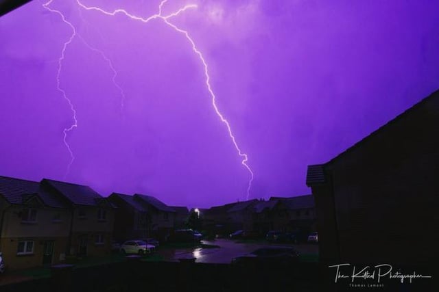 The sky lit up bright purple as lightning hit Falkirk, Scotland, on Tuesday night (Photo: The Kilted Photographer)