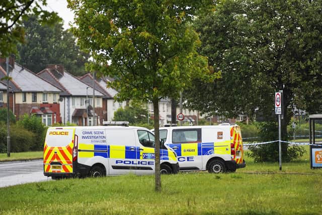 A second man has been arrested after a pedestrian was allegedly hit with a car and stabbed to death on Herringthorpe Valley Road. Picture Scott Merrylees